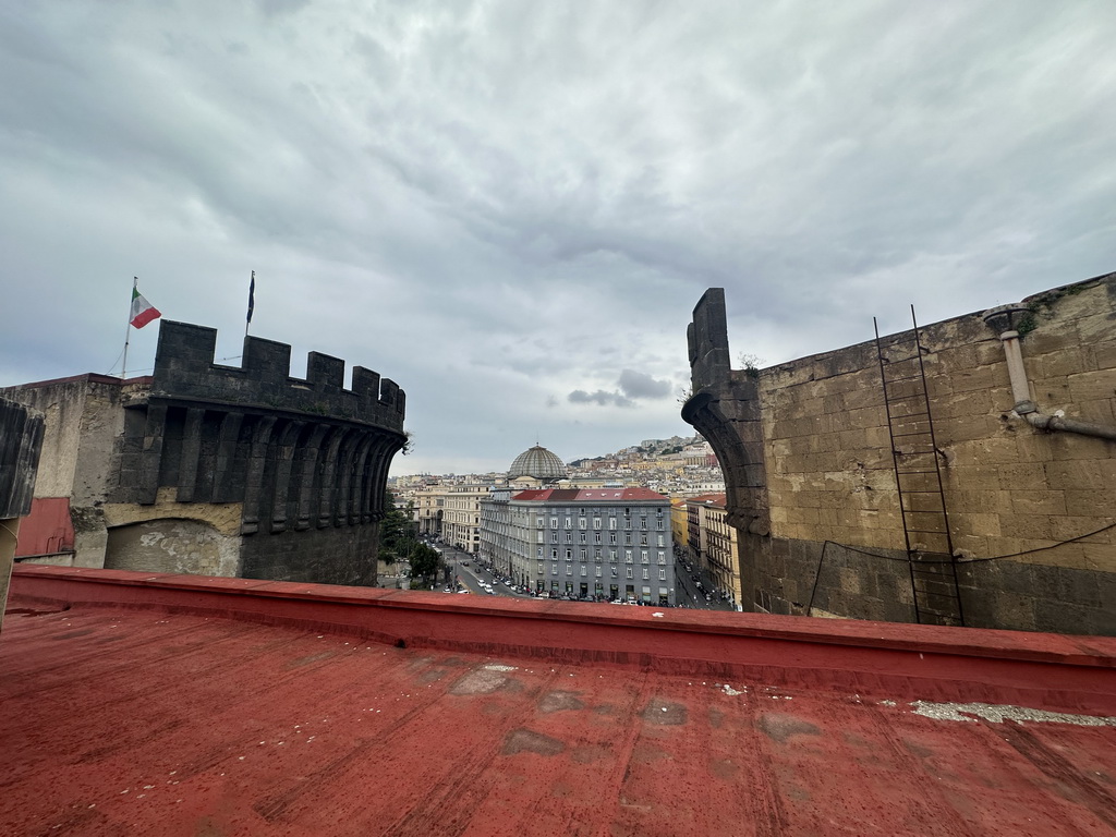 Northwest side of the roof of the Castel Nuovo castle with the Halfway Tower and the Tower of San Giorgio, with a view on the dome of the Galleria Umberto I gallery