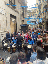 Street musicians and decorations for SSC Napoli`s third Italian championship at the crossing of the Via Toledo street and the Piazzetta Matilde Serao square
