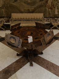 Music table at the Great Captain`s Hall at the Royal Palace of Naples, with explanation