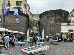 The Piazza Nolana square with the front of the Porta Nalona gate and the Mercato Porta Nolana market
