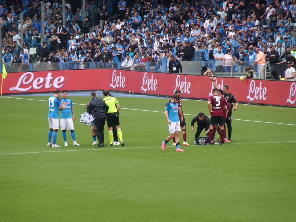 SSC Napoli player being treated at the Stadio Diego Armando Maradona stadium, viewed from the Curva A Inferiore grandstand, during the football match SSC Napoli - Salernitana