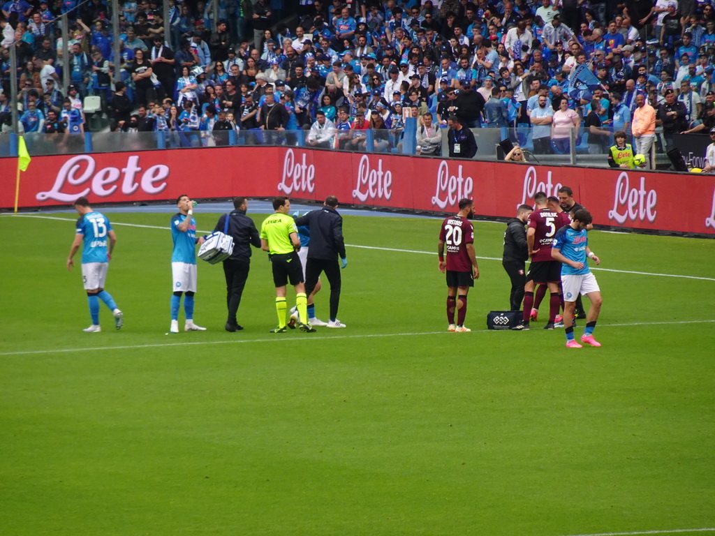 SSC Napoli player being treated at the Stadio Diego Armando Maradona stadium, viewed from the Curva A Inferiore grandstand, during the football match SSC Napoli - Salernitana