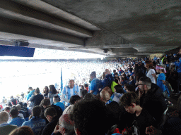 Football fans at the Curva A Inferiore grandstand at the Stadio Diego Armando Maradona stadium, during halftime at the football match SSC Napoli - Salernitana