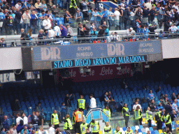 Football fans and stadium name at the Tribuna grandstand at the Stadio Diego Armando Maradona stadium, during halftime at the football match SSC Napoli - Salernitana