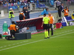 Referee in front of the dugout at the Stadio Diego Armando Maradona stadium, viewed from the Curva A Inferiore grandstand, during halftime at the football match SSC Napoli - Salernitana