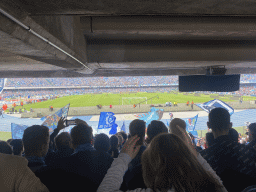 Players on the pitch and football fans at the Curva B grandstand celebrating a SSC Napoli goal at the Stadio Diego Armando Maradona stadium, during the football match SSC Napoli - Salernitana