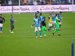 Players on the pitch at the Stadio Diego Armando Maradona stadium, viewed from the Curva A Inferiore grandstand, right after the football match SSC Napoli - Salernitana