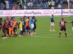 Players on the pitch at the Stadio Diego Armando Maradona stadium, viewed from the Curva A Inferiore grandstand, right after the football match SSC Napoli - Salernitana