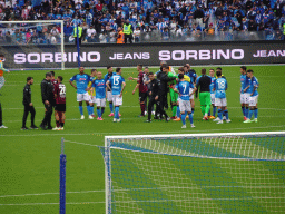 Players on the pitch at the Stadio Diego Armando Maradona stadium, viewed from the Curva A Inferiore grandstand, right after the football match SSC Napoli - Salernitana