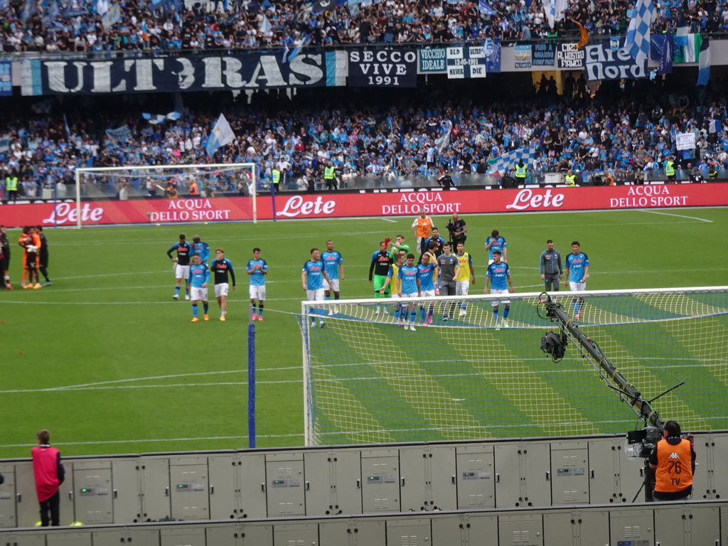 Players on the pitch thanking the crowd at the Stadio Diego Armando Maradona stadium, viewed from the Curva A Inferiore grandstand, right after the football match SSC Napoli - Salernitana