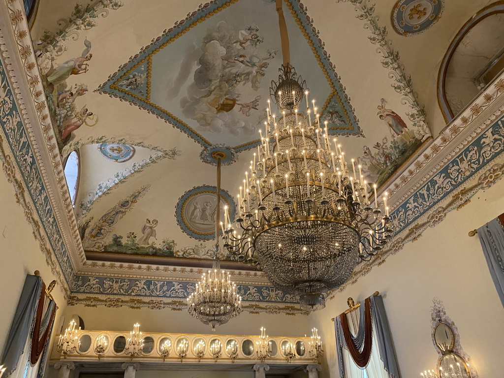 Chandeliers and frescoes on the ceiling of the Salone delle Feste room at the First Floor of the Museo di Capodimonte museum