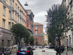 The Via Santa Maria di Costantinopoli street and the southeast side of the Naples National Archaeological Museum at the Piazza Museo square
