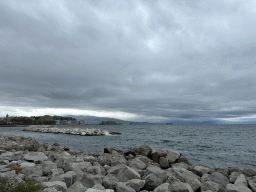 The beach at the Via Caracciolo Francesco street, with a view on the city center with the Castel dell`Ovo castle and Mount Vesuvius