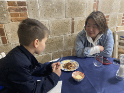 Miaomiao and Max eating Tiramisu at the Ristorante Osteria Sannazaro restaurant