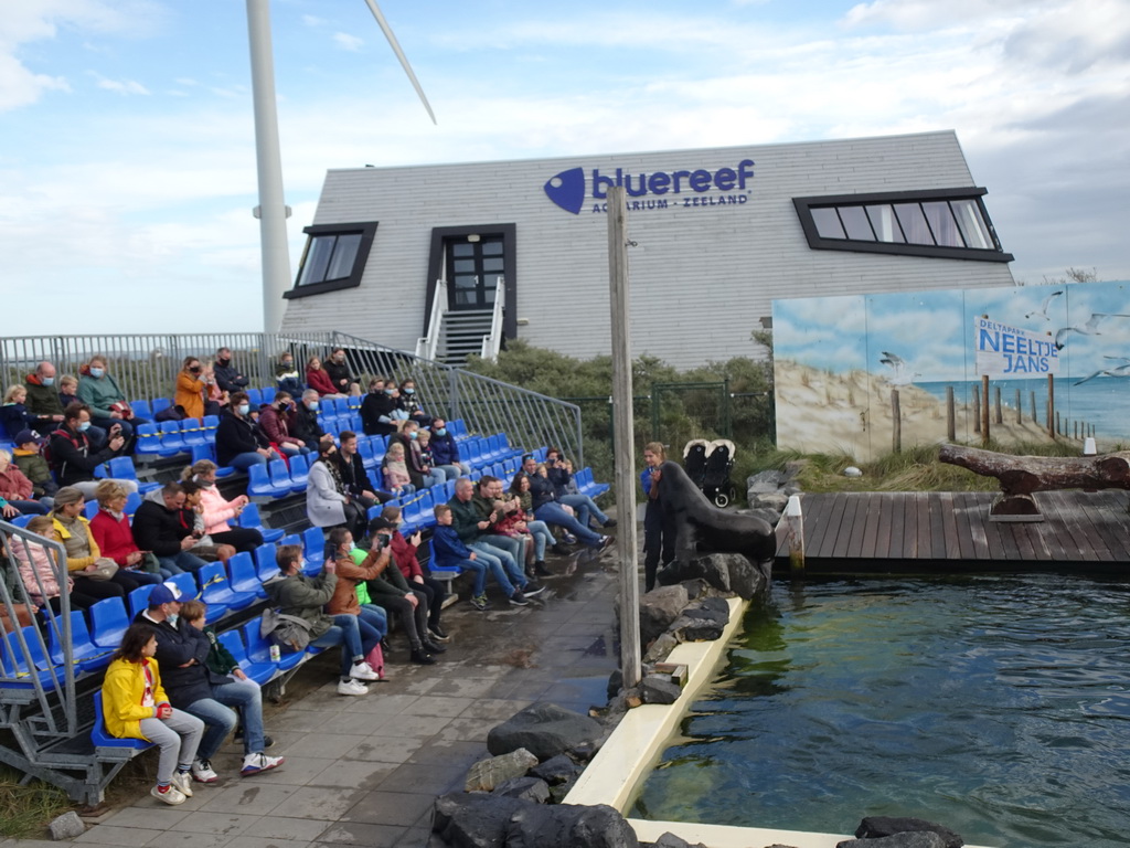 Zookeeper, California Sea Lion and the audience at the Deltapark Neeltje Jans, during the Sea Lion Show