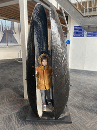 Max in a Mussel statue at the Delta Expo at the Deltapark Neeltje Jans