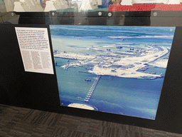 Photograph of the construction of the Oosterscheldekering dam at the Delta Expo at the Deltapark Neeltje Jans, with explanation