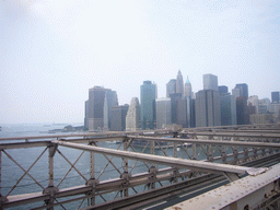 View on Manhattan and Liberty Island with the statue of Liberty, from Brooklyn Bridge