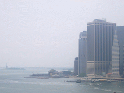 View on Manhattan and Liberty Island with the statue of Liberty, from Brooklyn Bridge