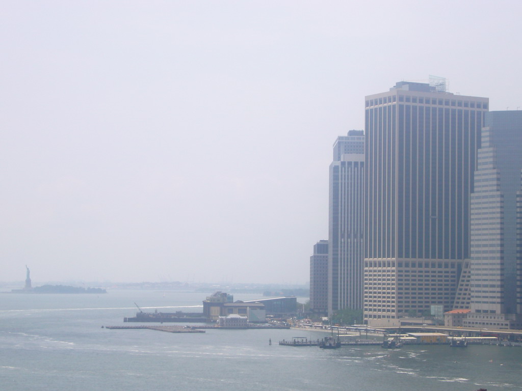 View on Manhattan and Liberty Island with the statue of Liberty, from Brooklyn Bridge