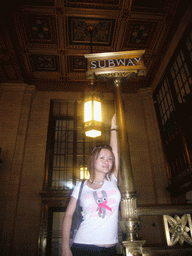 Miaomiao at a subway sign in the Grand Central Terminal