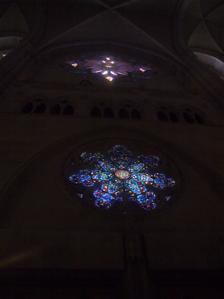 The Great Rose Window and another stained glass window in the Cathedral of Saint John the Divine