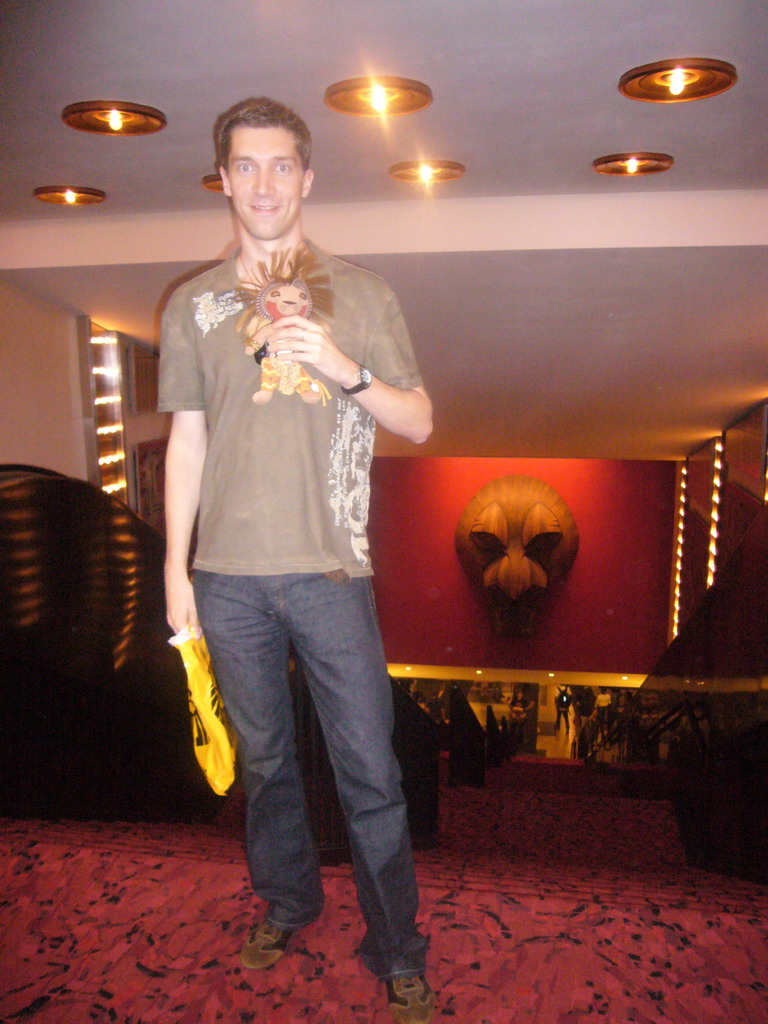 Tim with a plush Lion King, in the lobby of the Minskoff Theatre