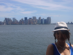 Miaomiao and the skyline of Manhattan, from Liberty Island