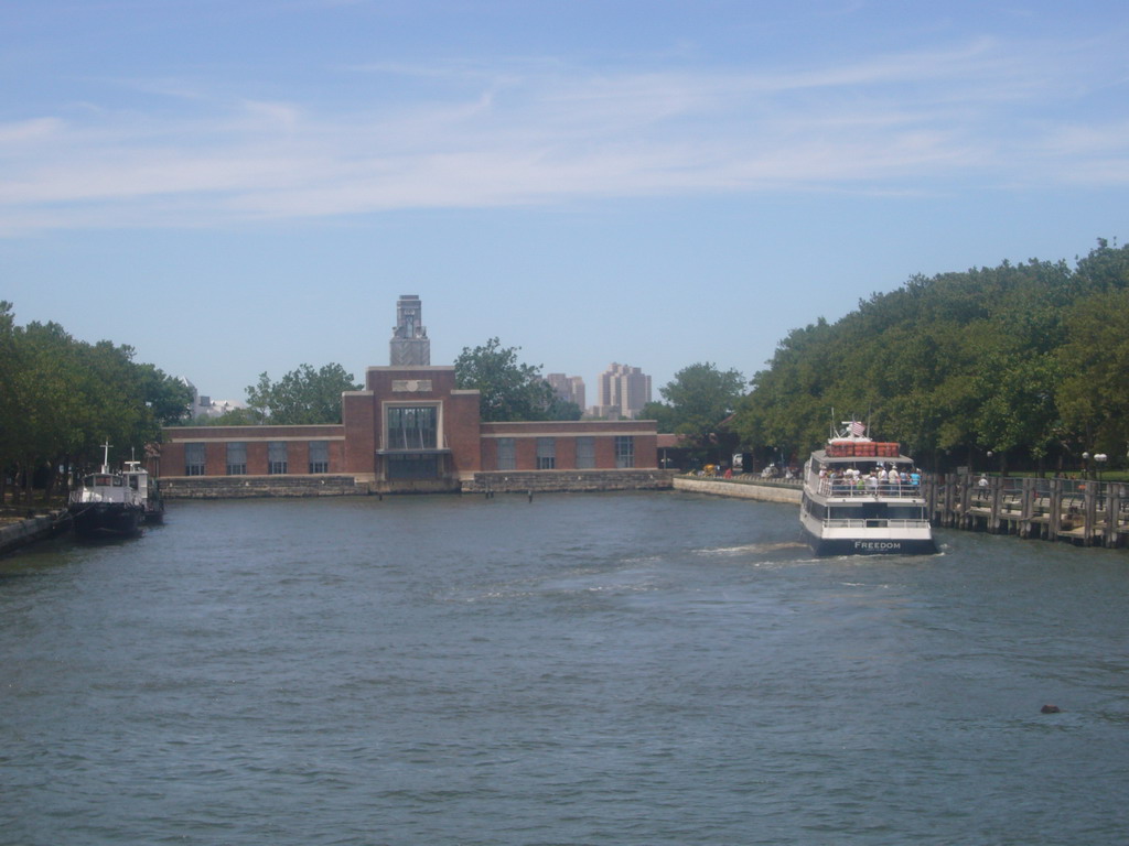 The dock of Ellis Island and a boat, from the Liberty Island - Ellis Island ferry