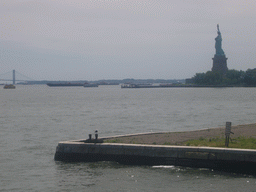 Liberty Island, boats and Brooklyn Bridge, from Ellis Island