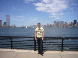 Tim and the skylines of Jersey City and Manhattan, from Ellis Island