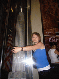 Miaomiao with a scale model of the Empire State Building