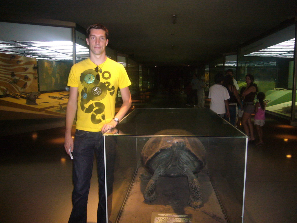 Tim with a model of a turtle, in the American Museum of Natural History