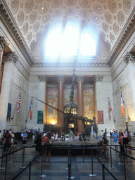 The Theodore Roosevelt Memorial Hall, in the American Museum of Natural History, with skeletons of a Barosaurus and an Allosaurus