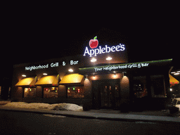 Front of Applebee`s Neighborhood Grill & Bar in Hawthorne, by night