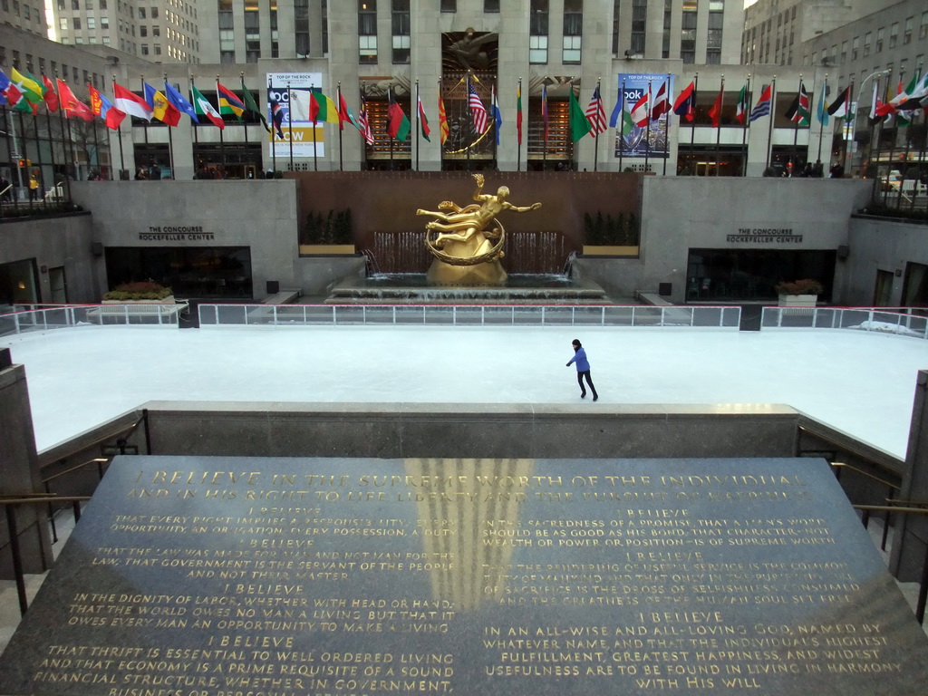 Ice-skating rink, Prometheus statue and plaque at the Lower Plaza at Rockefeller Center