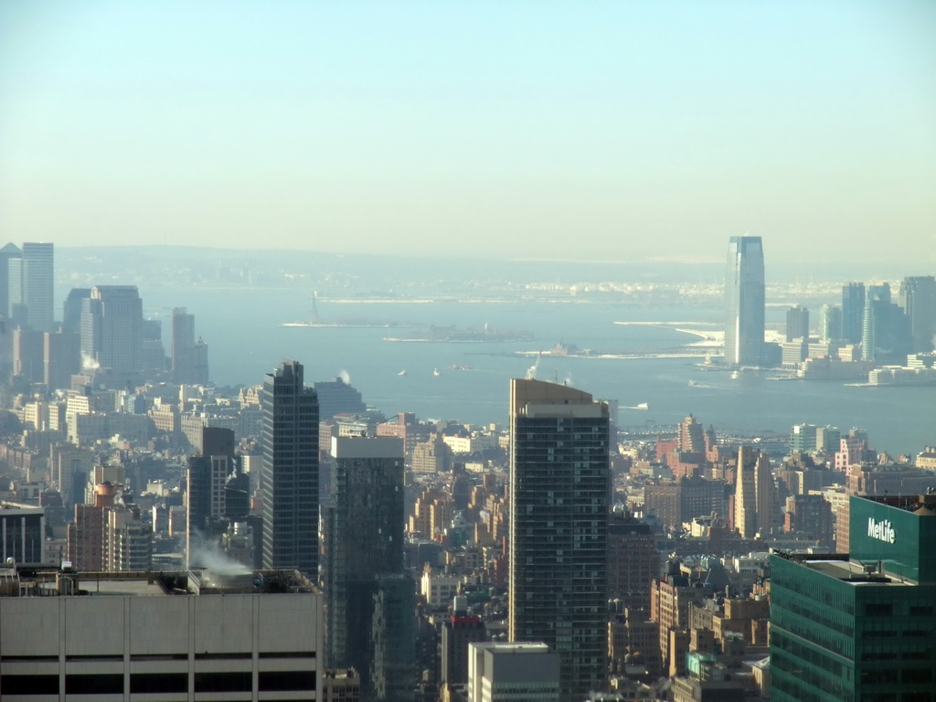 Southwest side of Manhattan, skyline of Jersey City, the Hudson River, Liberty Island with the Statue of Liberty and Ellis Island, viewed from the `Top of the Rock` Observation Deck at the GE Building of Rockefeller Center