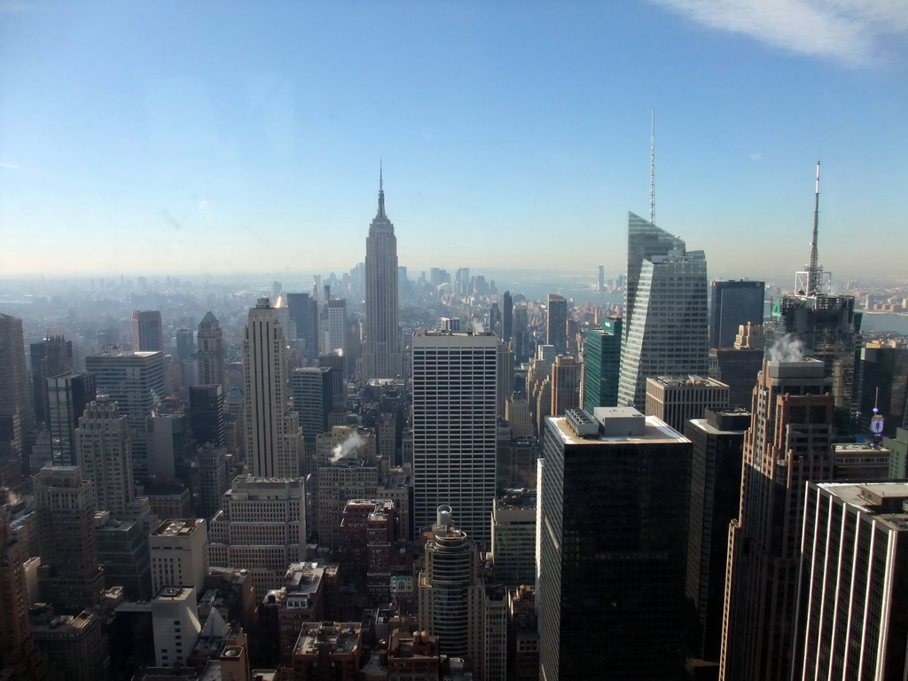 Skyline of Manhattan with the Empire State Building, the Bank of America Tower and the Condé Nast Building, viewed from the `Top of the Rock` Observation Deck at the GE Building of Rockefeller Center