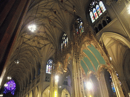 The high altar with baldachin, nave and rose window at Saint Patrick`s Cathedral