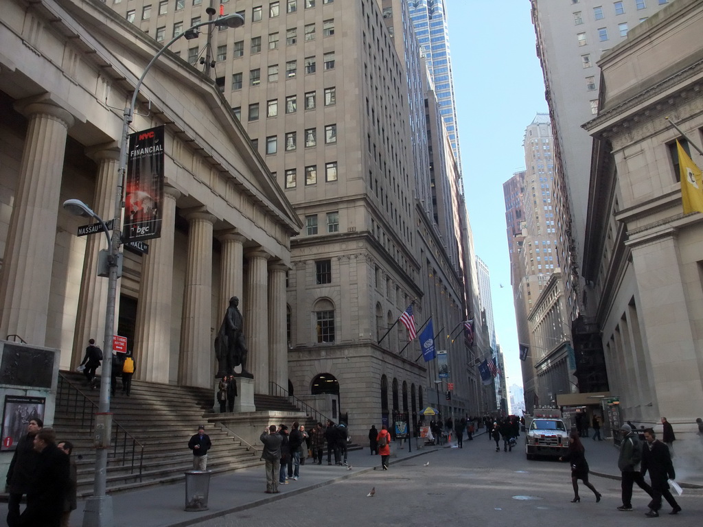 Wall Street and with the Federal Hall National Memorial and statue of George Washington
