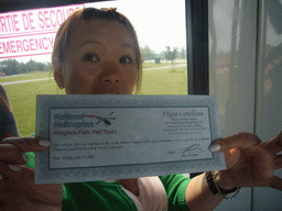 Miaomiao and her flight certificate of the National Helicopters Niagara Falls Heli Tours