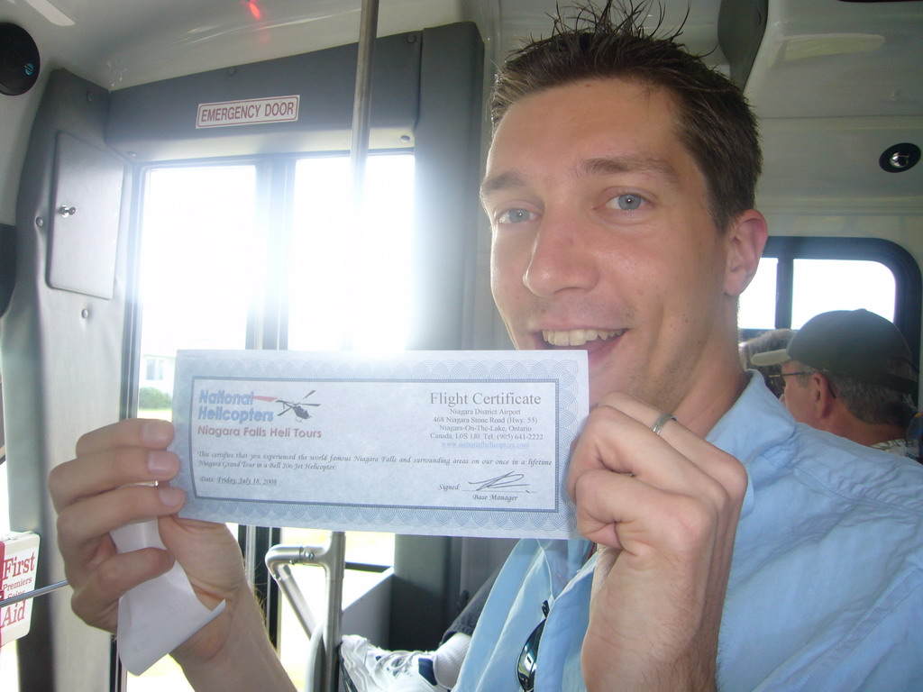 Tim and his flight certificate of the National Helicopters Niagara Falls Heli Tours