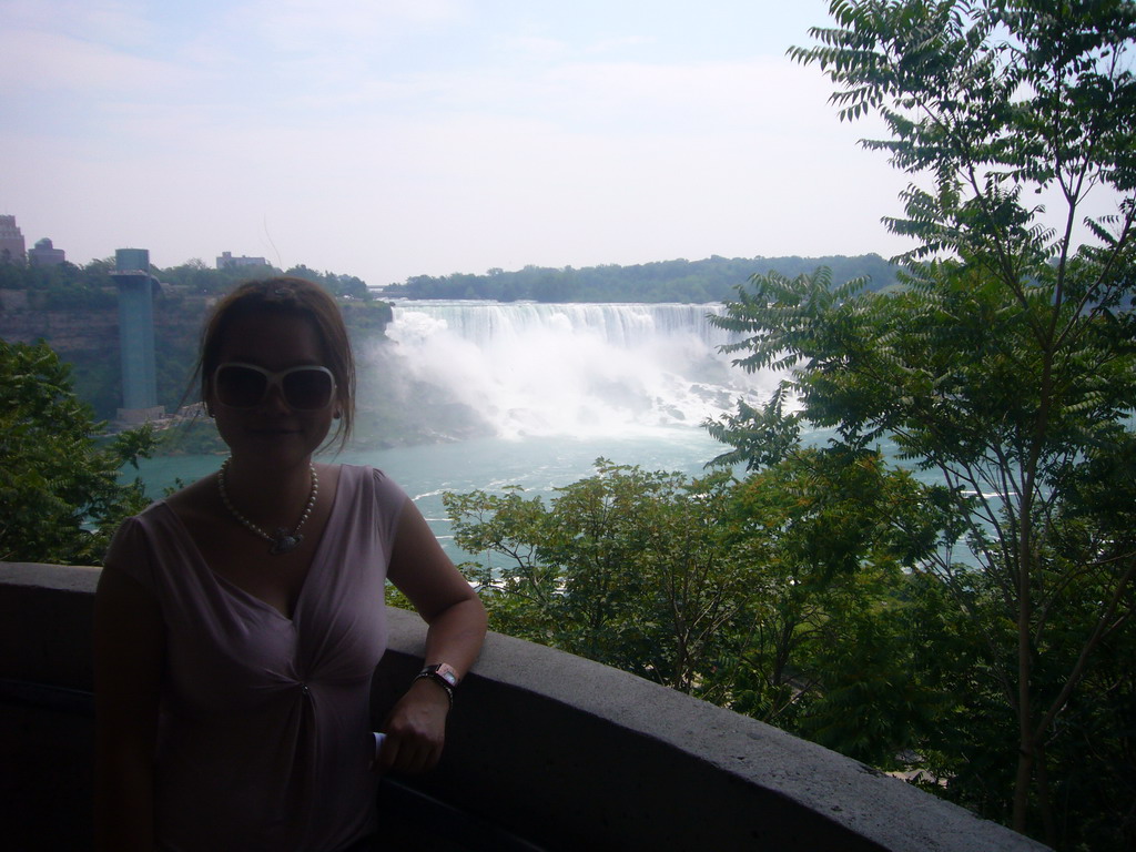 Miaomiao and a view on the American Falls from the entrance building to the Maid of the Mist