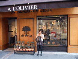 Miaomiao in front of the A l`Olivier olive oil shop in the Rue Saint-François de Paule street, at Vieux-Nice