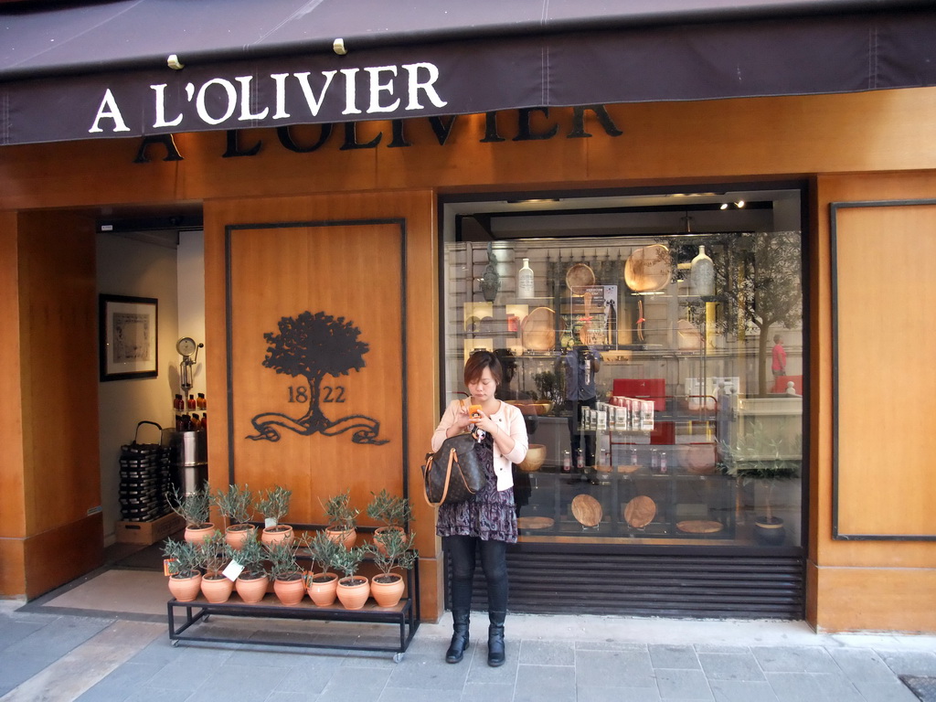 Miaomiao in front of the A l`Olivier olive oil shop in the Rue Saint-François de Paule street, at Vieux-Nice
