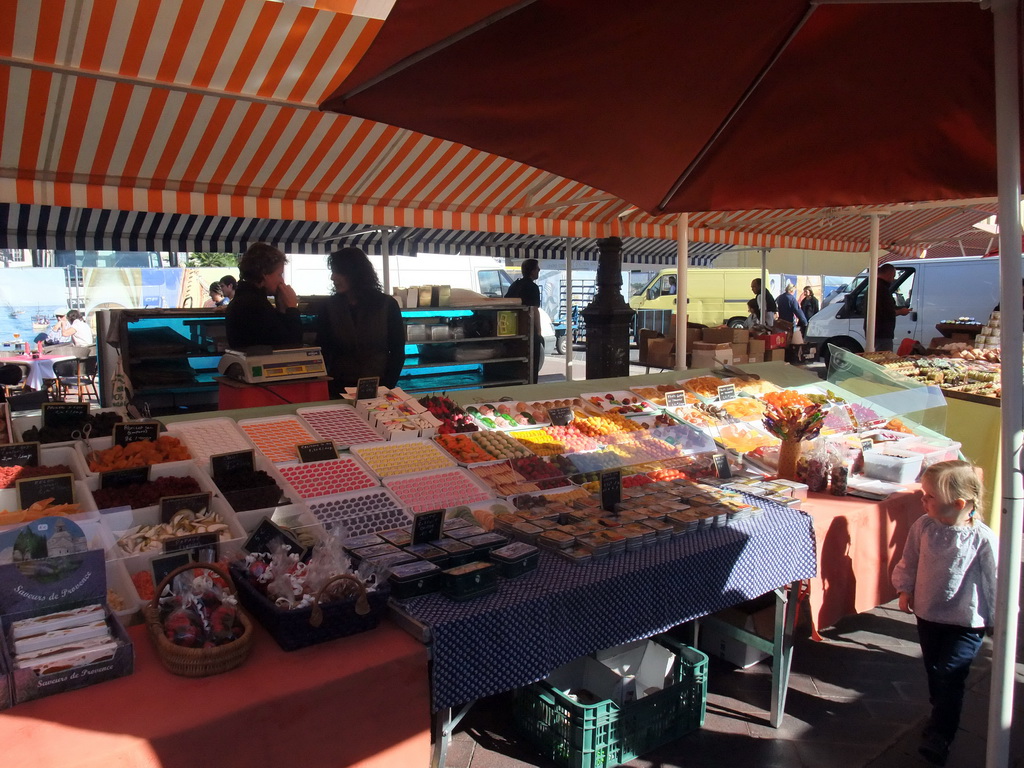 Market stall with candies at the Marché aux Fleurs market at the Cours Saleya street, at Vieux-Nice