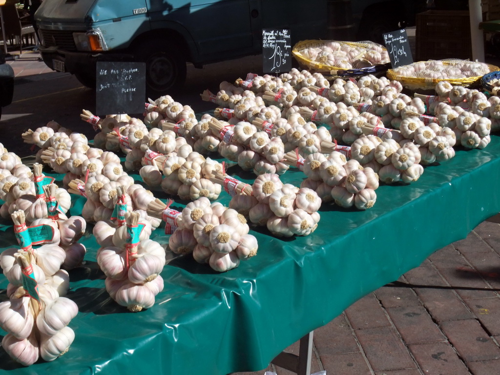 Market stall with garlic at the Marché aux Fleurs market at the Cours Saleya street, at Vieux-Nice