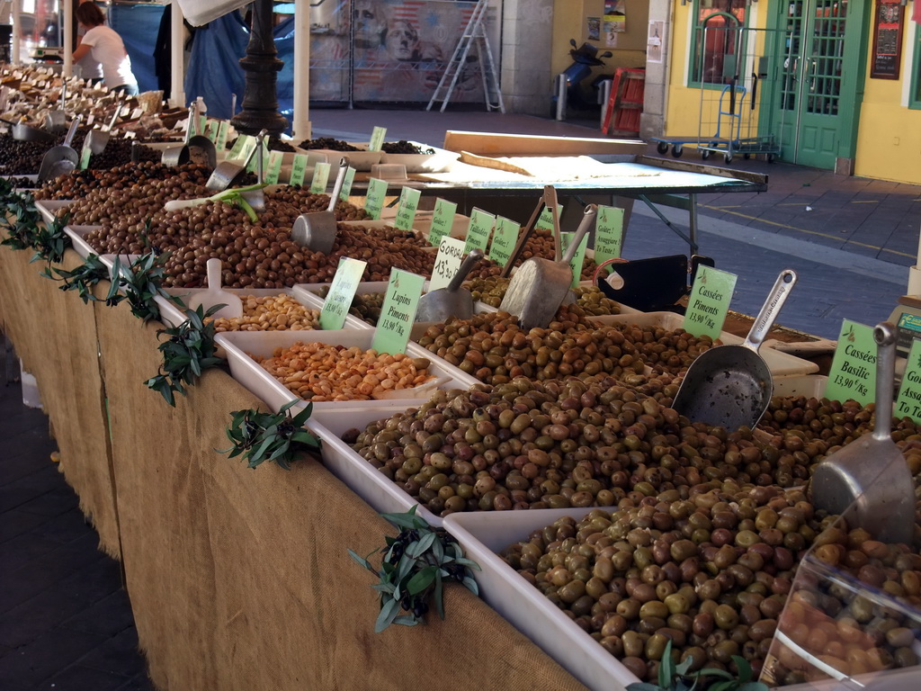 Market stall with olives at the Marché aux Fleurs market at the Cours Saleya street, at Vieux-Nice