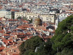 Trees and the Sainte-Réparate Cathedral in Vieux-Nice, viewed from the Parc du Château