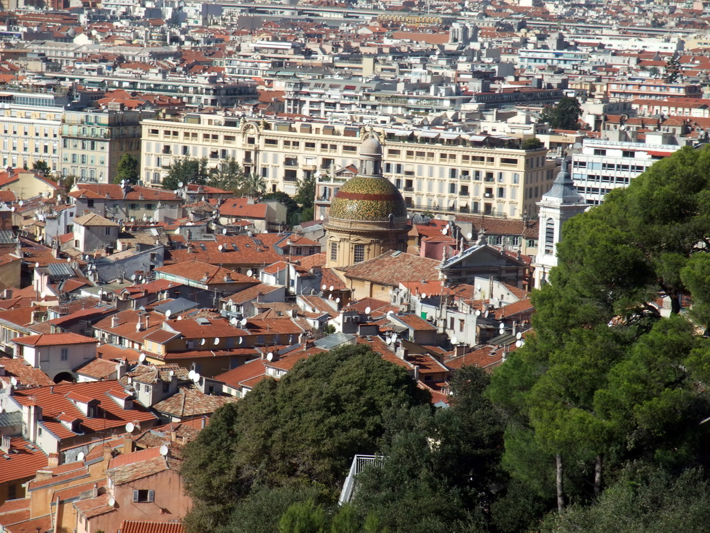 Trees and the Sainte-Réparate Cathedral in Vieux-Nice, viewed from the Parc du Château